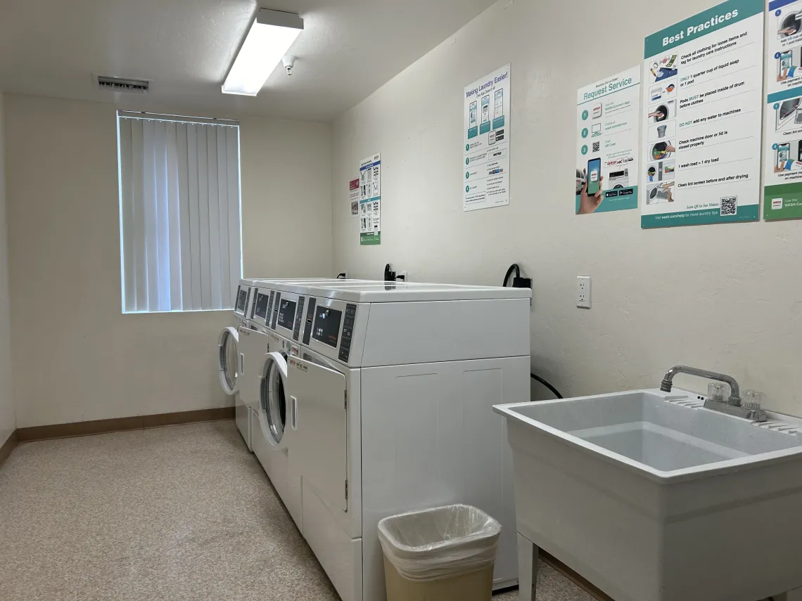 La Aldea community laundry room